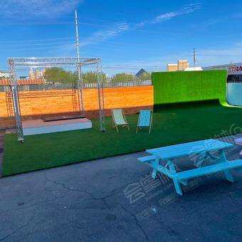 Outdoor Studio with Strip Views and Grass CYC